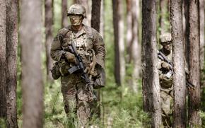 Sgt. Matthew Krysa, an indirect fire infantryman with V Corps, patrols with his squad during a medical triage event at U.S. Army Europe and Africa's Best Squad Competition in Grafenwoehr, Germany, on Aug. 6, 2024.