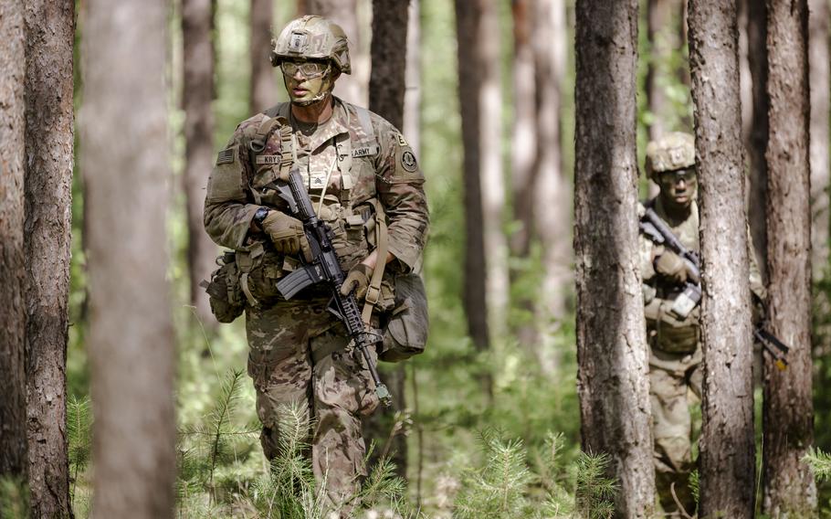 Sgt. Matthew Krysa, an indirect fire infantryman with V Corps, patrols with his squad during a medical triage event at U.S. Army Europe and Africa’s Best Squad Competition in Grafenwoehr, Germany.