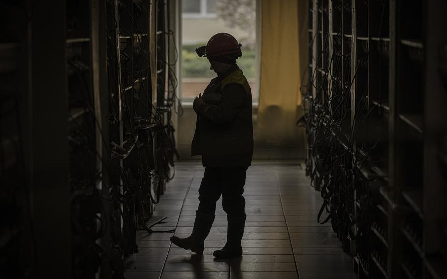 A miner prepares for work at a mine in the Dnipro region of Ukraine. 