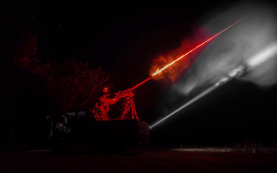 A Ukrainian serviceman fires a machine gun during training in Kherson region, Ukraine, Oct. 4, 2024.