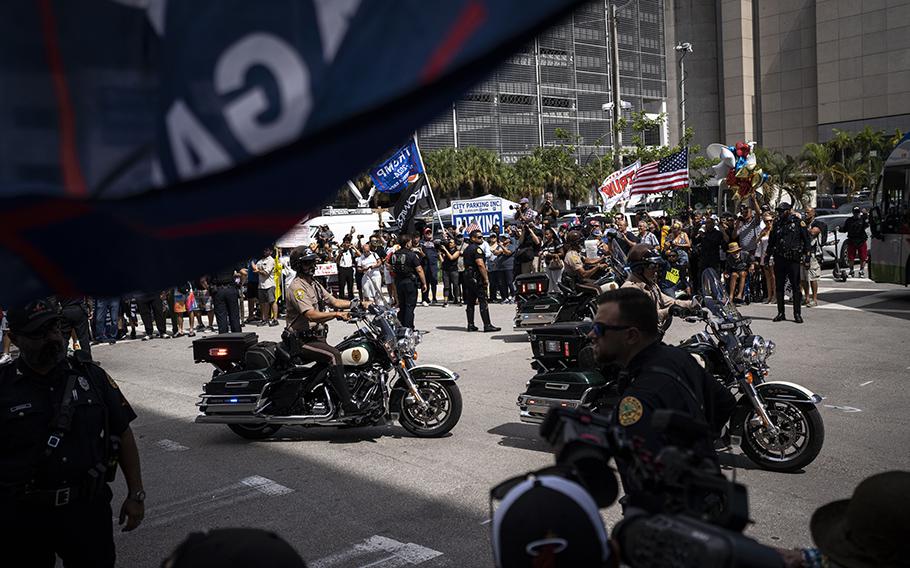 The motorcade of former president Donald Trump leaves the Wilkie D. Ferguson Jr. U.S. Courthouse in Miami on Tuesday, June 13, 2023.