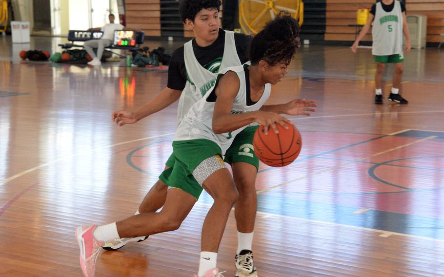 Mateo Solano and Maurice Brown battle in practice.