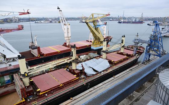 The destroyed hatch of the grain cargo ship "AYA" is covered by a foil in the Black Sea port of Constanta September 19, 2024. The Ukrainian navy said the ship was hit with a cruise missile on Sept. 12. "As a result of the attack, the bulk carrier AYA, which was transporting grain from the Ukrainian port of Chornomorsk to Egypt and was in the Black Sea at the time, was severely damaged," the navy said. (Daniel Mihailescu/AFP/Getty Images/TNS)