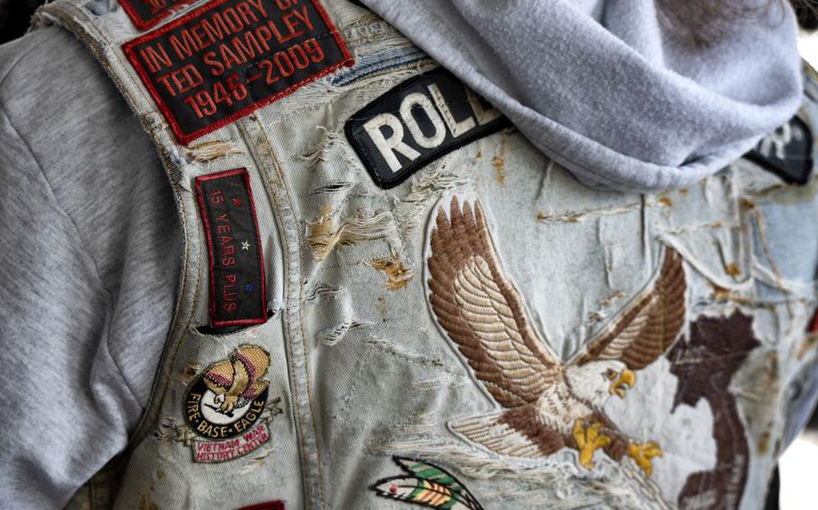 At a Pearl Harbor Day Commemoration ceremony that took place on board the Battleship New Jersey, a Vietnam Veteran’s jacket is adorned with patches including one, upper left, that honors Ted Sampley, a fellow American Vietnam War veteran and activist, who primarily advocated for service members still considered missing in action or prisoners of war (POW-MIA).