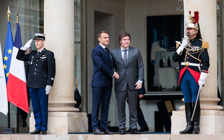 French President Emmanuel Macron welcomes President of Argentina Javier Milei at Elysee Palace on July 26, 2024 in Paris, France.