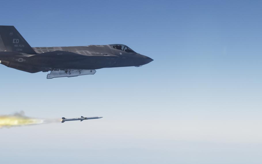 An F-35 Lightning II launches an AIM-120 advanced medium range air-to-air missile over a test range off the California coast in 2013. The United States approved the sale of AIM-120 missiles to Romania and Norway as both nations work to meet NATO's 2% defense spending target.