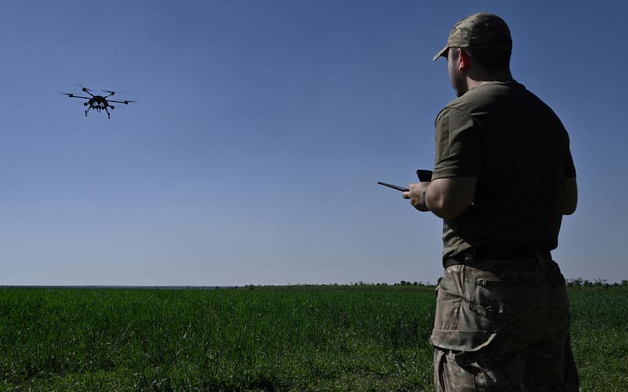 A Ukrainian serviceman of the “Achilles” Battalion from the 92nd Brigade of the Ukrainian army runs test flights with a Vampire hexacopter drone ahead of missions, in the eastern Donetsk region on Tuesday, April 30, 2024. These drones are almost exclusively used at night to drop munitions on Russian targets or supplies and medical necessities to Ukrainian soldiers on the frontline.