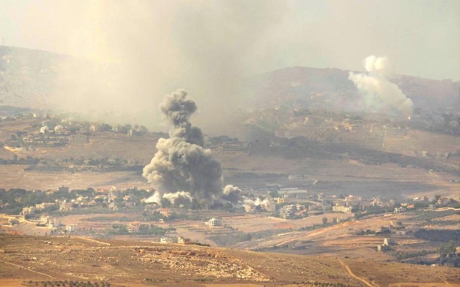 Smoke rises from Israeli airstrikes on villages in the Nabatiyeh district, seen from the southern town of Marjayoun, Lebanon, Monday, Sept. 23, 2024.