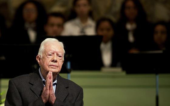 FILE - Former President Jimmy Carter teaches Sunday School class at Maranatha Baptist Church in his hometown on Aug. 23, 2015, in Plains, Ga. (AP Photo/David Goldman, File)