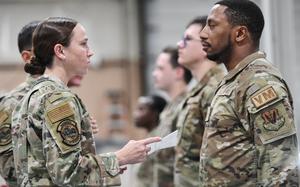 Maj. Caitlin Oviatt, 55th Logistics Readiness commander, inspects a shaving waiver at Offutt Air Force Base, Neb., July 9, 2024. 