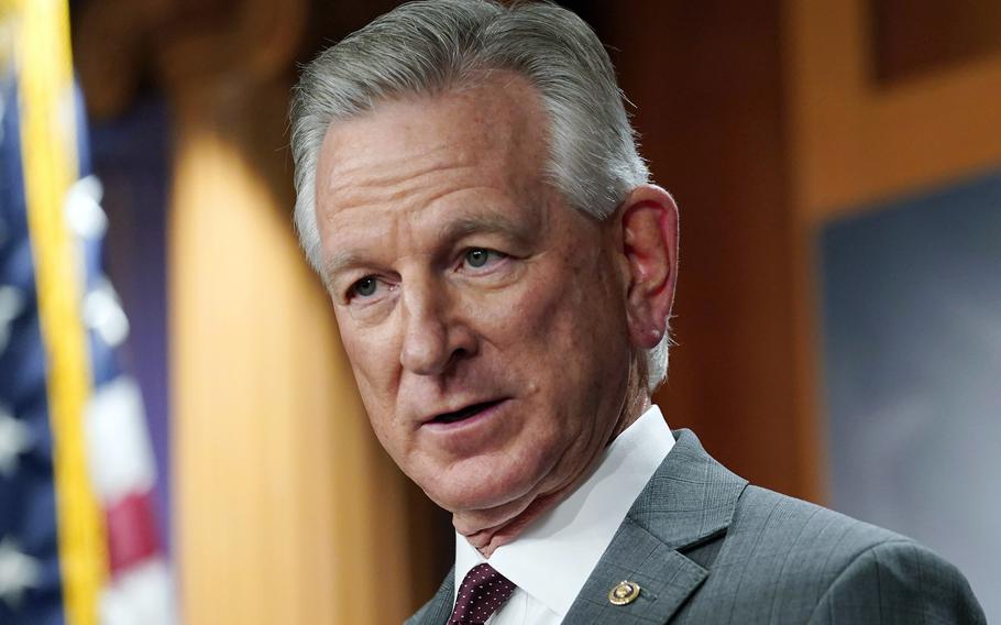 Tommy Tuberville listens to a question during a news conference