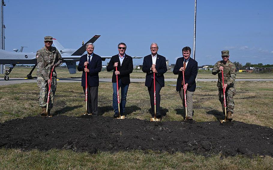 From left, Maj. Gen. Al Dohrmann, adjutant general for the N.D. National Guard; U.S. Sen. John Hoeven; Gov. Doug Burgum, commander and chief of the N.D. National Guard; U.S. Sen. Kevin Cramer; Shawn Dobberstein, Executive Director at Fargo Airport Authority; and Col. Mitch Johnson, 119th Wing commander, participate in the ceremonial ground breaking for the North Dakota Air National Guard’s new consolidated operations facility, Fargo Air National Guard base, Fargo, N.D., August 24, 2021.