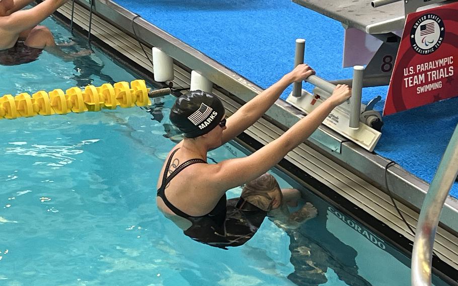 Army Sgt. 1st Class Elizabeth Marks gets ready to swim in the 100-meter backstroke S6 preliminaries on June 27, 2024. Marks broke her own world record in the event with a time of 1:19.57 and will be competing in the 2024 Paris Paralympics.