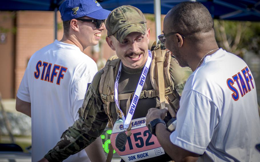 Tech. Sgt. Jeffery Herron of the 8th Security Forces Squadron at Kunsan Air Base finishes first in a nearly 19-mile Norwegian foot march during the Four Chaplains event at Osan Air Base, South Korea, on May 18, 2024.