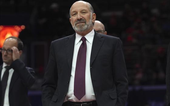 Howard Lutnick watches as President Donald Trump attends an indoor Presidential Inauguration parade event at Capital One Arena, Monday, Jan. 20, 2025, in Washington. (AP Photo/Evan Vucci)