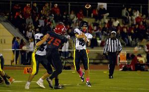 Stuttgart quarterback Kai Lewis throws a ball into the flat during a DODEA-Europe Division I football semifinal against Kaiserslautern on Oct. 25, 2024, at Kaiserslautern High School in Kaiserslautern, Germany.