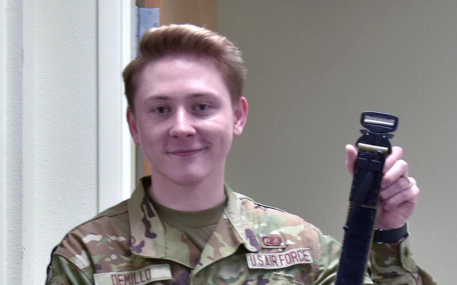 Senior Airman Isaiah Demillo, a country liaison with the 82nd Training Support Squadron, holds up his invention, the Demillo rigger’s tourniquet belt, on June 6, 2024, at Sheppard Air Force Base, Texas. 