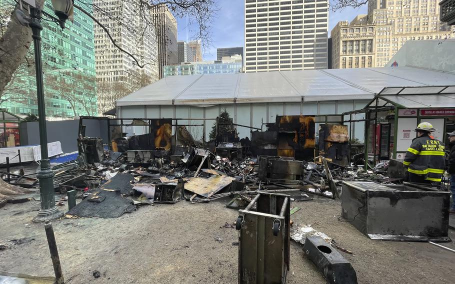 The aftermath of a fire at an outdoor holiday market