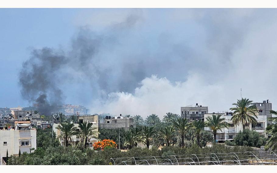 Smoke rises during an Israeli air strike, amid the Israel-Hamas conflict, in central Gaza Strip, June 8, 2024. 