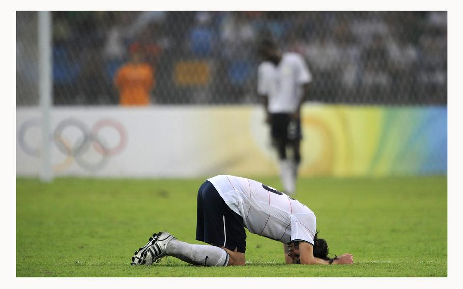 The United States’ Sacha Kljestan goes to the ground at the end of a match against Nigeria during a 2008 Beijing Olympic Games group match at the Worker’s Stadium in Beijing on Aug. 13, 2008. Nigeria won, 2-1.