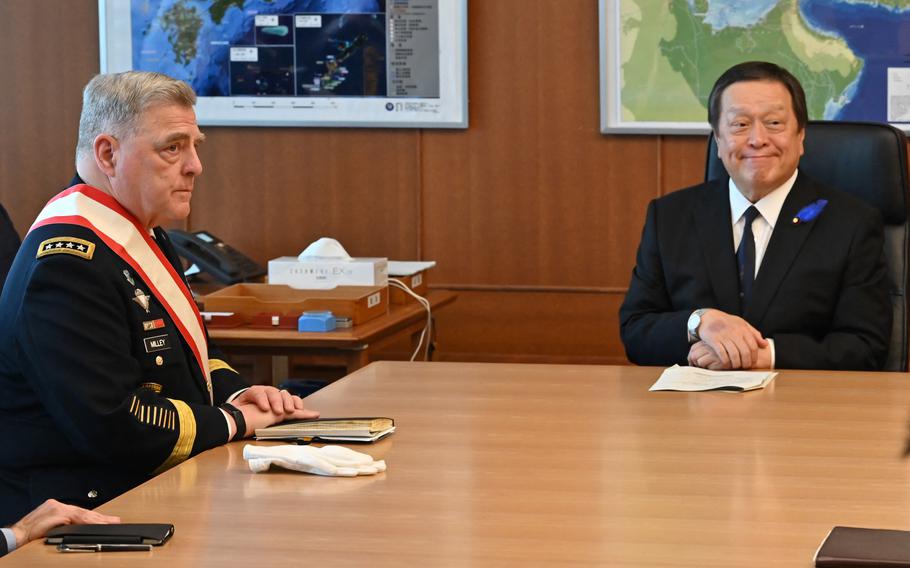In this photo from July 14, 2023, US Army Gen. Mark A. Milley (L), the chairman of the Joint Chiefs of Staff, meets with Japan’s Defense Minister Yasukazu Hamada at the Defense Ministry in Tokyo. 