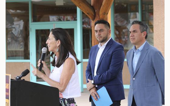 U.S. Rep. Teresa Leger Fernández, left, is flanked by Democratic Congressmen Gabe Vasquez, of New Mexico, and Pete Aguilar, of California, as she speaks during a news conference in Albuquerque, N.M., Tuesday, Aug. 13, 2024. (AP Photo/Susan Montoya Bryan)