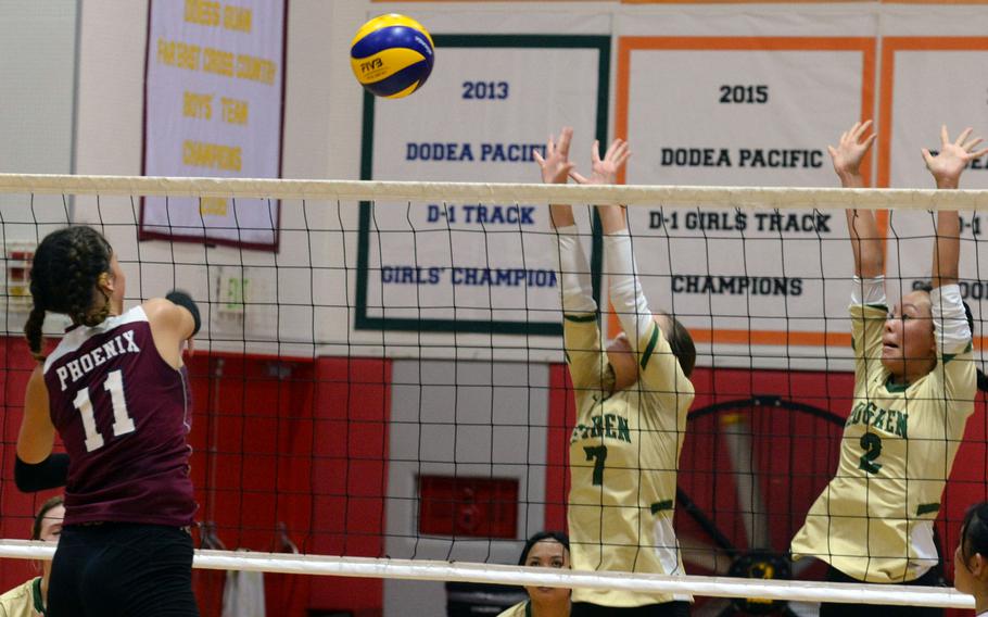 Seisen's Piipi Hill spikes against Robert D. Edgren's Kaiya Pasion and Kaleiana Alonzo during Saturday's two-set Phoenix victory in an inter-district match.