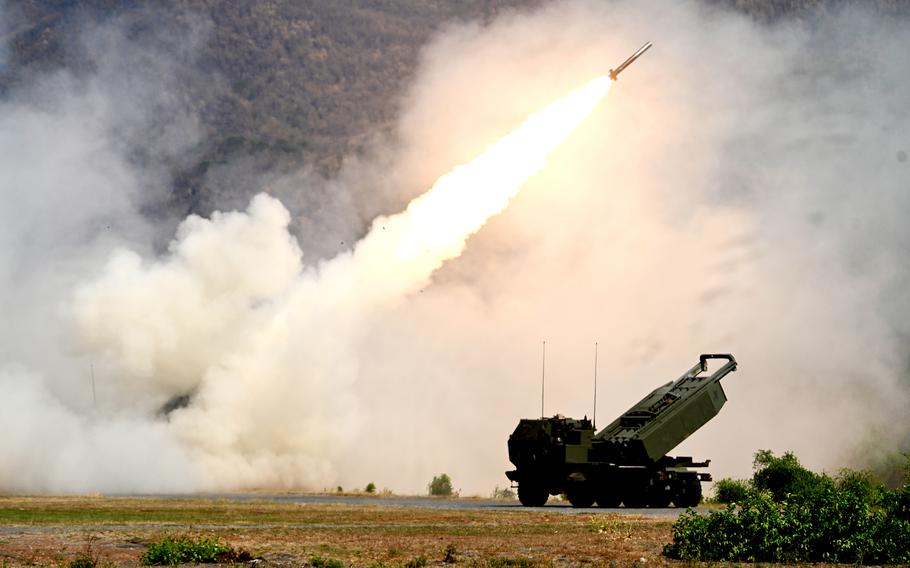 A light multiple rocket launcher fires artillery.