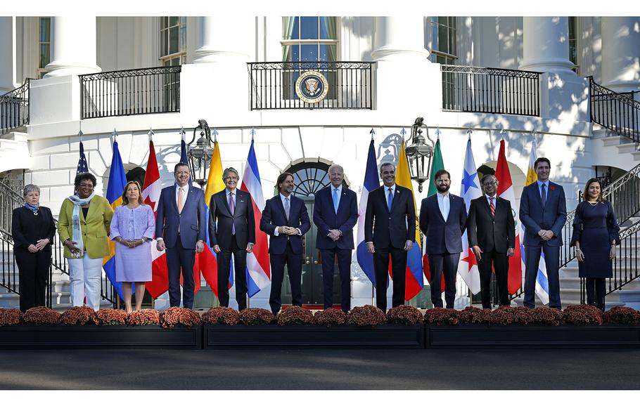 Left to right, Mexican Foreign Secretary Alicia Barcena, Barbadian President Sandra Mason, Peruvian President Dina Boluarte, Costa Rican President Rodrigo Chaves Robles, Ecuadoran President Guillermo Lasso, Uruguayan President Luis Lacalle Pou, U.S. President Joe Biden, Dominican President Luis Abinader, Chilean President Gabriel Boric, Colombian President Gustavo Francisco Petro, Canadian Prime Minister Justin Trudeau and Panamanian Foreign Minister Janaina Tewaney pose for a photograph with invited leaders during the inaugural Americas Partnership For Economic Prosperity Leaders' Summit on the South Lawn of the White House on Nov. 3, 2023, in Washington, D.C.  