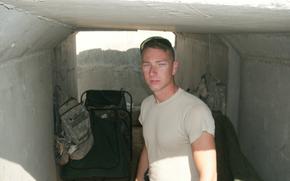 This undated photo provided by Amy Arthur in 2024 shows her husband, Chris Arthur, in Iraq. (Courtesy Amy Arthur via AP)