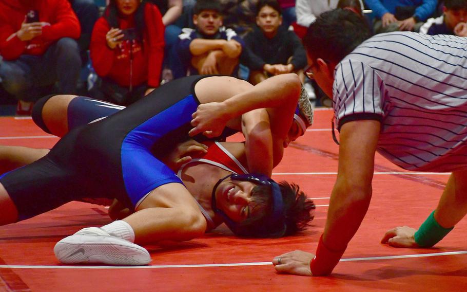 Judah Salmon tries to pin Bayron Cerron.