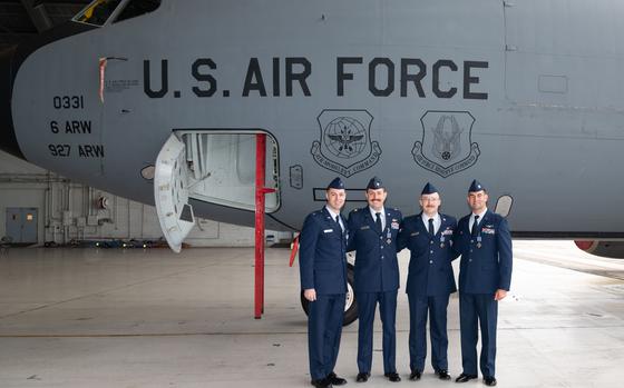 Distinguished Flying Cross recipients from the 6th Air Refueling Wing pose for a photo following a ceremony at MacDill Air Force Base, Florida, Jan. 23, 2025. The aircrew obeyed an order to change their flight path and flew the KC-135 tanker towards an escalated situation on the ground. The pilots executed a precise orbit pattern over the fighter jets engaged in an air-to-ground strike, providing critical support and demonstrating exceptional coordination and professionalism in a high-stakes mission. (U.S. Air Force photo by Senior Airman Sterling Sutton)