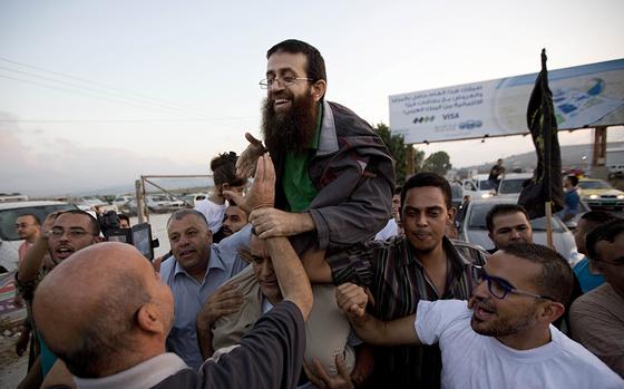 File Palestinian Khader Adnan Center Is Greeted By Palestinians After His Release From An