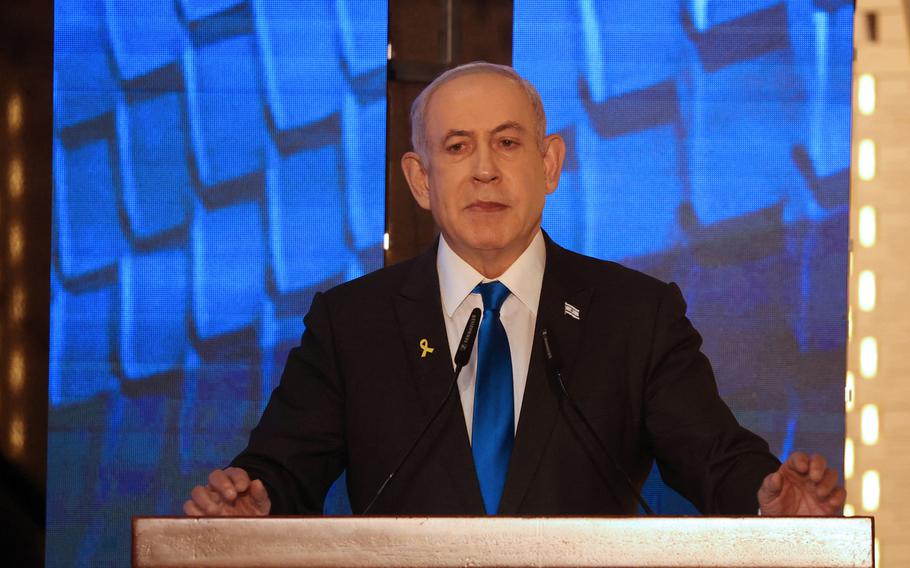 Israeli Prime Minister Benjamin Netanyahu speaks during a ceremony marking Memorial Day for fallen soldiers of Israel's wars and victims of attacks, at Jerusalem's Mount Herzl military cemetery, May 13, 2024.