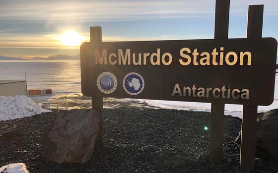 191023-A-OM702-1001 MCMURDO STATION, Antarctica (Oct. 23, 2019) McMurdo Station sign overlooking the Ross Sea. Defense Media Activity sent technicians to McMurdo Station, Antarctica to conduct media system maintenance and upgrades. (U.S. Army photo by Sgt. 1st Class Peter Yokel/Released)