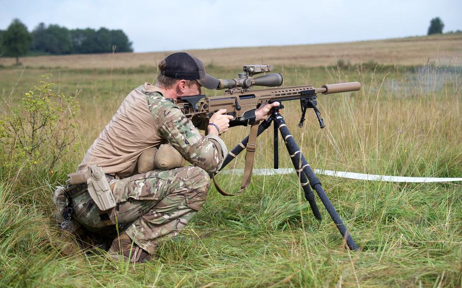 A U.S. Army sniper from 2nd Battalion, 4th Infantry Regiment fires a shot at a moving target during the eighth annual European Best Sniper Team Competition on Aug. 8, 2024, at the Joint Multinational Readiness Center in Hohenfels, Germany.