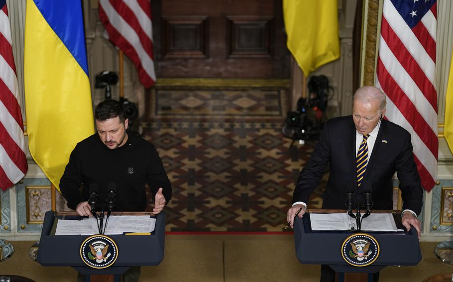 Ukrainian President Volodymyr Zelenskyy speaks during a news conference with President Joe Biden in the Indian Treaty Room in the Eisenhower Executive Office Building on the White House Campus, Tuesday, Dec. 12, 2023, in Washington.