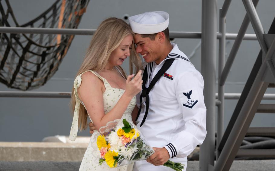 Sonar Technician (Surface) 3rd Class Samuel T. Monsoor assigned to the Arleigh Burke-class guided-missile destroyer USS Halsey (DDG 97) reunites with his girlfriend during the ship’s homecoming ceremony at Naval Base San Diego, Aug. 16, 2024.