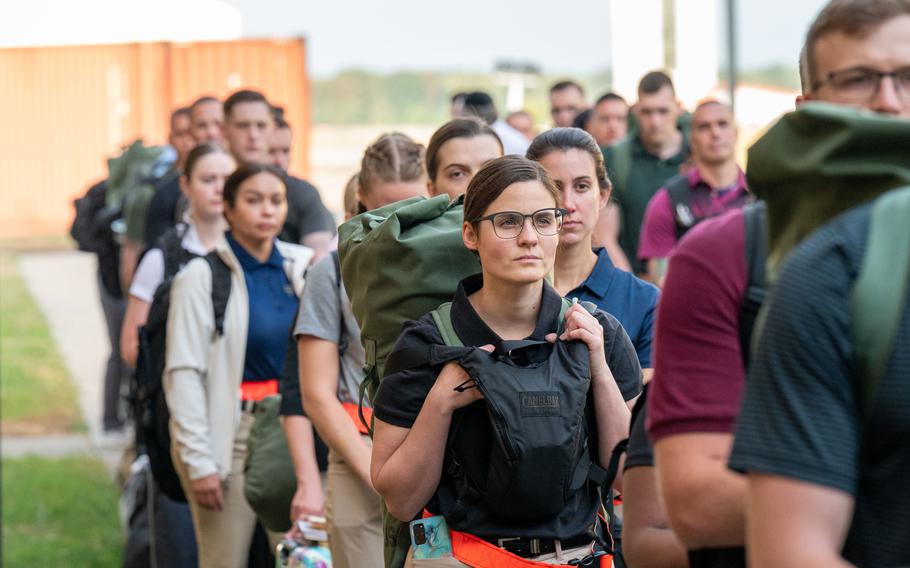 New Officer Training School students listen to instructions during processing at Maxwell Air Force Base, Ala., Oct. 10, 2023. Under the new model, OTS will accelerate officer development, service officials say.