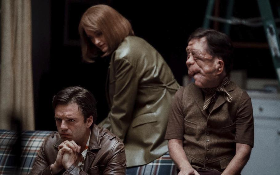 From left, Sebastian Stan as Edward, Renate Reinsve as Ingrid, Edward’s neighbor and a playwright, and Adam Pearson as Oswald in a scene from “A Different Man.” The film follows Edward, a disfigured man who, after getting experimental surgery to get rid of his neurofibromatosis, gets upstaged by Oswald, another man with neurofibromatosis, in a play inspired by Edward’s own friendship with his neighbor Ingrid.