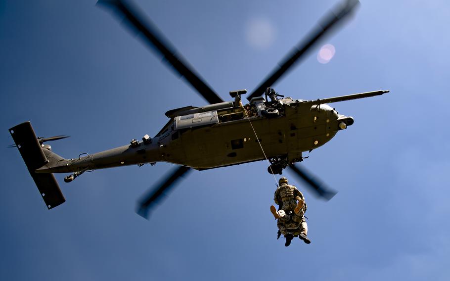 Airmen assigned to the 41st and 38th Rescue Squadrons conduct hoist training at Moody Air Force Base, Ga., in March 2022. In December, U.S. Air Force pararescue troops and other quick reaction forces launched a rescue operation at an undisclosed location in the Horn of Africa that saved two people.
