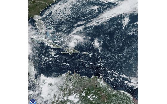 This satellite image provided by NOAA on Saturday, Oct. 19, 2024 shows Hurricane Oscar.  (NOAA via AP)