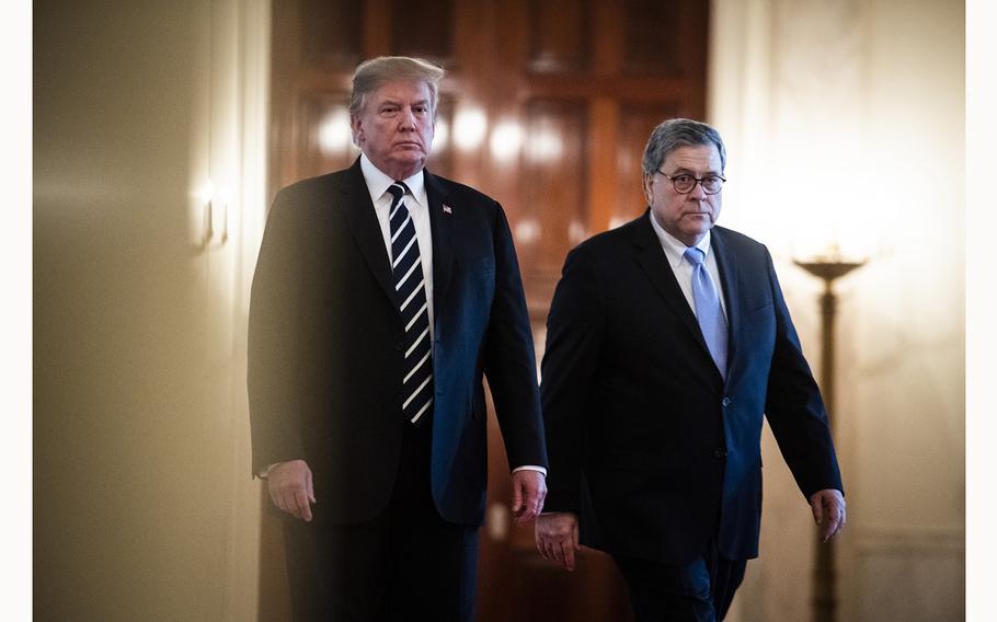 Trump and Barr attend a ceremony in the East Room of the White House in May 2019.