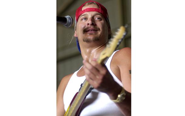 HED: Devil without a casue, 2003

Baghdad, Iraq, June 19, 2003: Kid Rock plays for the soldiers at the first USO show at Baghdad airport. Nearly 7,000 soldiers watched the show, but many other soldiers complain that entertainers do not travel to bases outside the main U.S. hubs.

META TAGS: Operation Iraqi Freedom; Wars on Terror; USO; military life; entertainment