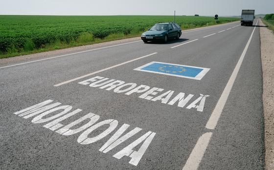 A sign painted on a road outside Comrat, Moldova, June 11, 2024. 