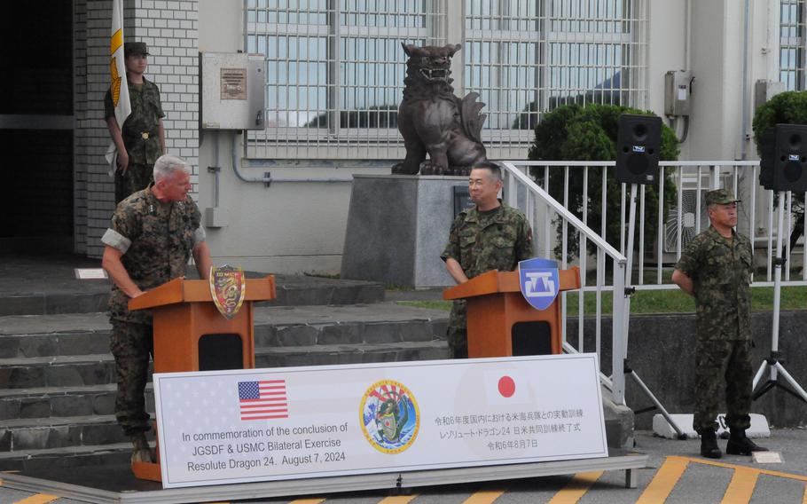 Lt. Gen. Roger Turner, III Marine Expeditionary Force commander, speaks alongside Lt. Gen. Masayoshi Arai, the head of Japan's Western Army, during the closing ceremony for the Resolute Dragon exercise at Camp Courtney, Okinawa, Wednesday, Aug. 7, 2024. 