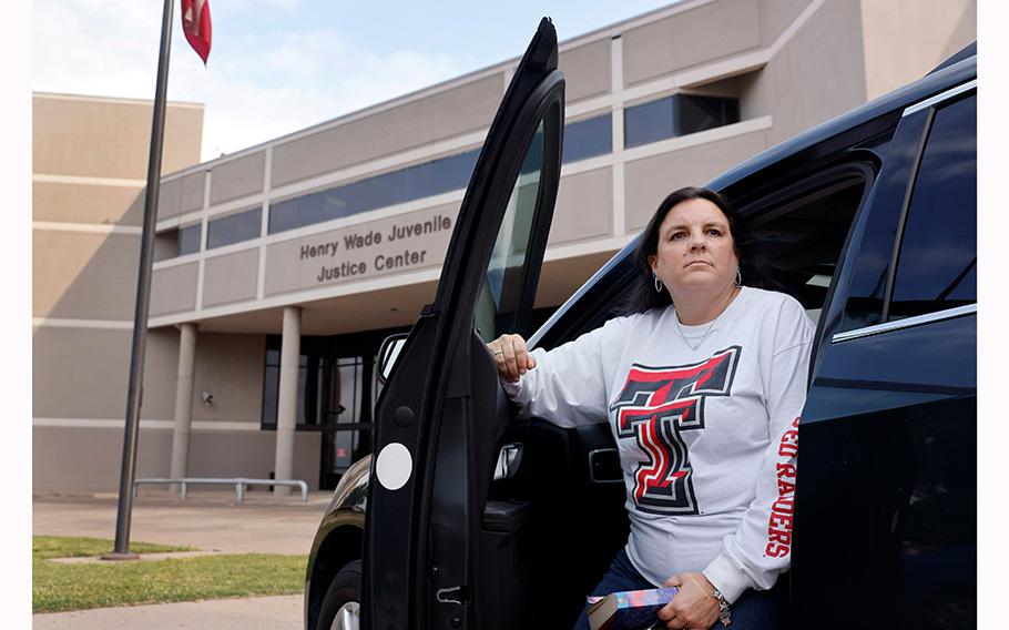 Ashley Lively, the mother of a 15-year-old boy being held at the Dallas County Juvenile Department inside the Henry Wade Juvenile Justice Center Dallas, is seen April 18, 2023 outside the facility. She comes for a 15-minute visitation period after waiting a couple hours to get in.