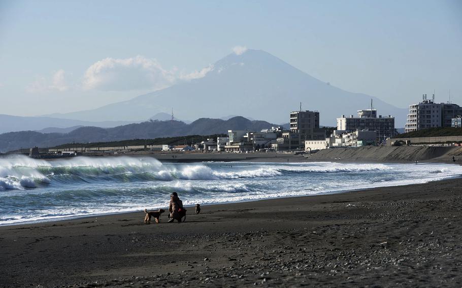 Mount Fuji is seen from a beach in Chigasaki, Japan, Jan. 19, 2021.