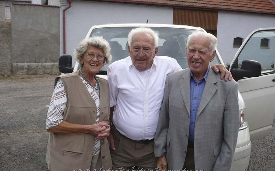 Hildegard Reschke, Joseph Owsianik and Willi Reschke pose