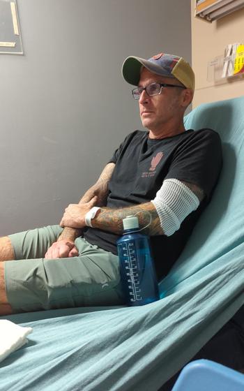 Mark Jackson, a 47-year-old Army veteran, said he has experienced health problems, including unexplained infections that have led to sepsis and multiple hospital stays since serving in 2003 and 2004 at the Karshi-Khanabad Air Base, a former Soviet installation, in Uzbekistan. Jackson is shown at a Florida hospital in 2005 where he was treated for an infection in his elbow. 